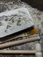 Geology dig kit featuring opal excavation blocks and tools, perfect for budding geologists and sensory play.