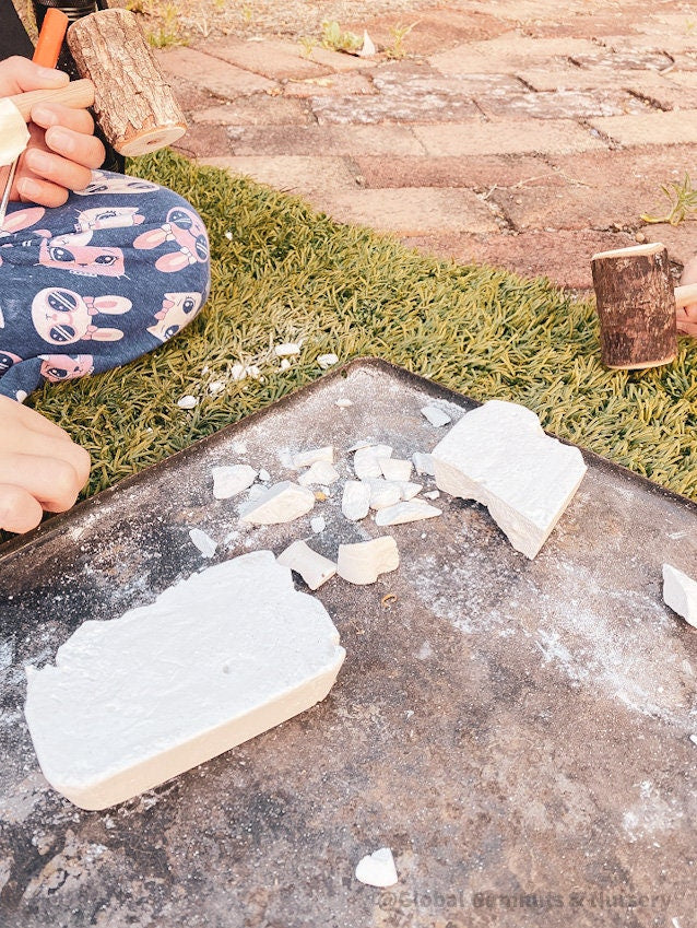 Geology dig kit featuring opal excavation blocks and tools, perfect for budding geologists and sensory play.