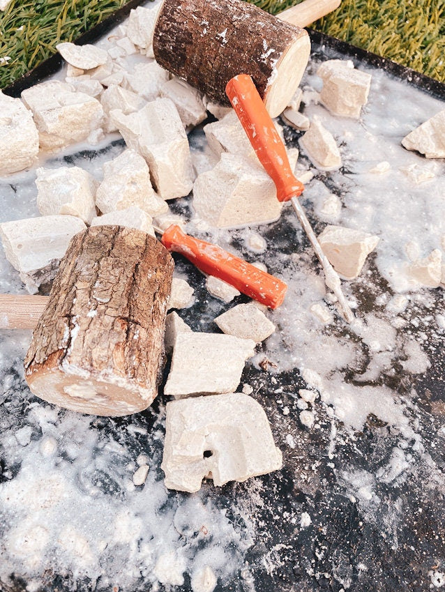 Geology dig kit featuring opal excavation blocks and tools, perfect for budding geologists and sensory play.
