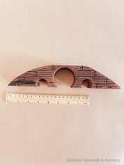 Handcrafted wooden bridge with three passages, perfect for fairy gardens or magical small-world play.
