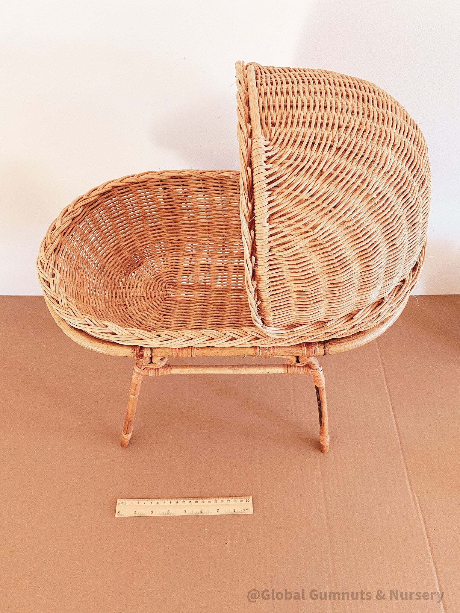 Vintage wicker dolls bassinet, a charming two-piece rattan set.