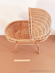 Vintage wicker dolls bassinet, a charming two-piece rattan set.