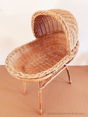 Vintage wicker dolls bassinet, a charming two-piece rattan set.
