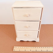 Dollhouse wooden chest of drawers, ready to paint or decorate. Perfect for miniature furniture enthusiasts.