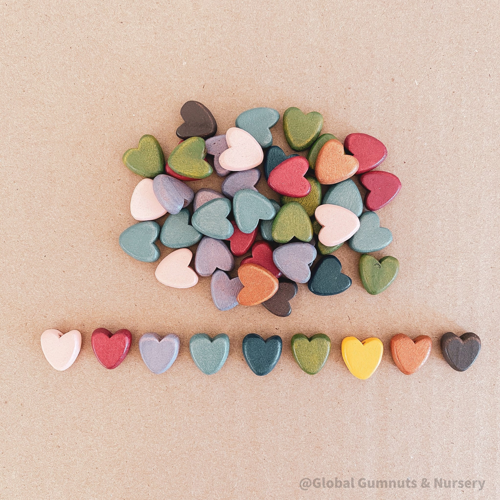 Set of 10 colorful 15mm wooden hearts, ideal for crafting, decorating, or adding charm to DIY projects.