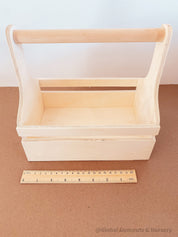 Wooden toolbox for little creatives, perfect for imaginative play or organizing kids’ craft supplies.
