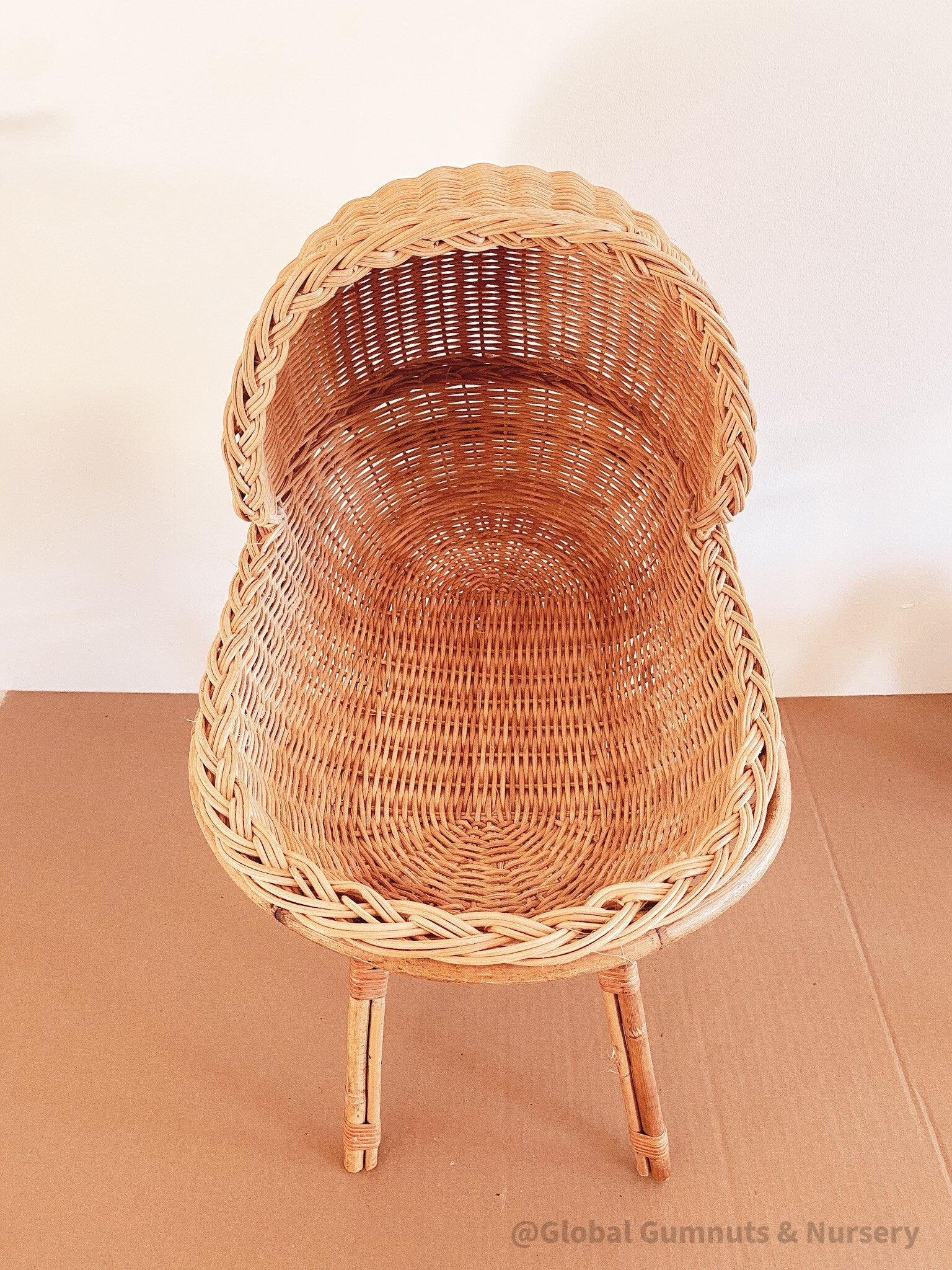 Vintage wicker dolls bassinet, a charming two-piece rattan set.