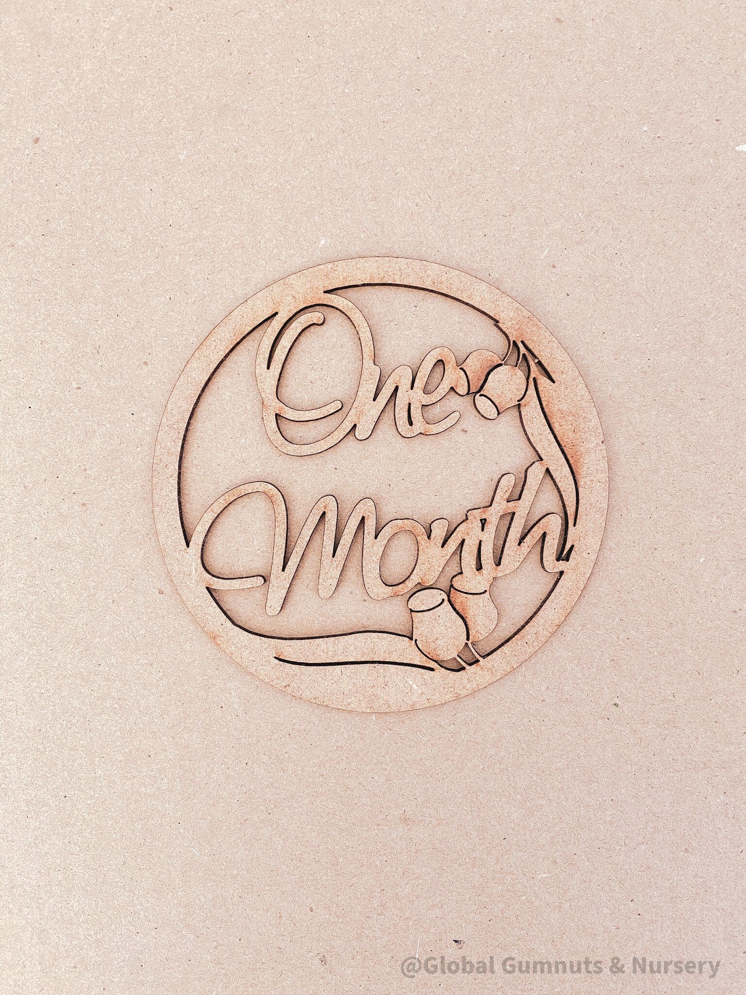 1-Month Milestone Disc: Elegant wooden disc to celebrate a baby's first month.
