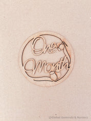 1-Month Milestone Disc: Elegant wooden disc to celebrate a baby's first month.
