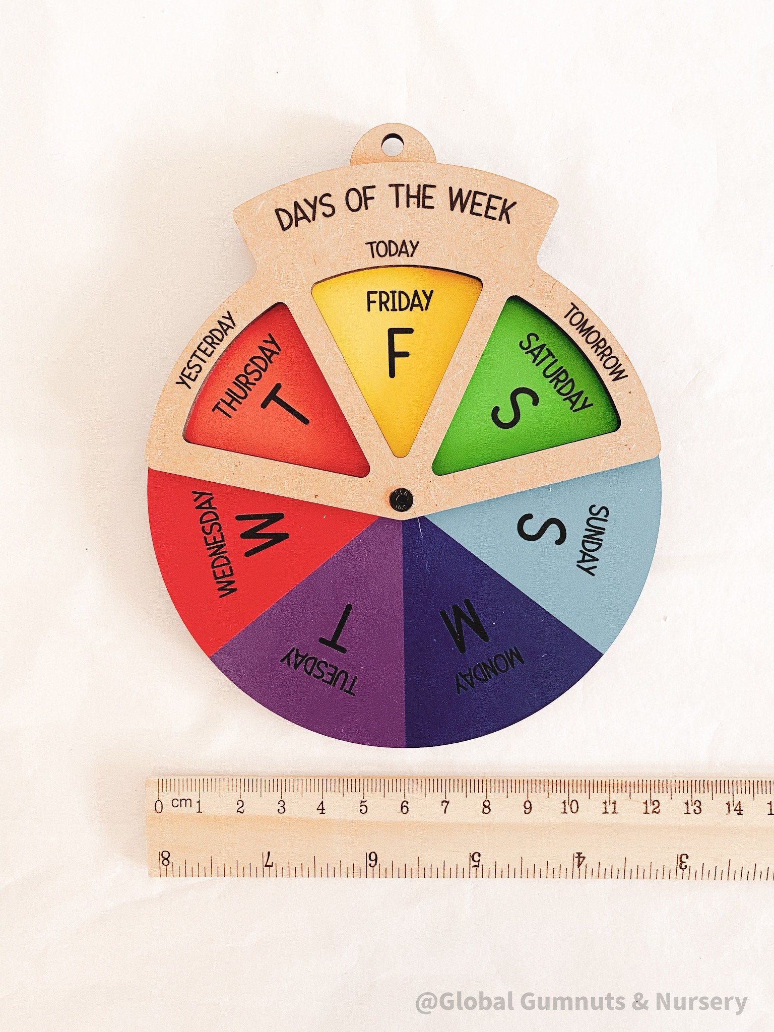 Days of the Week Wheel: Educational MDF round wheel with three-way viewer to display the days of the week; features a spinner for easy use.