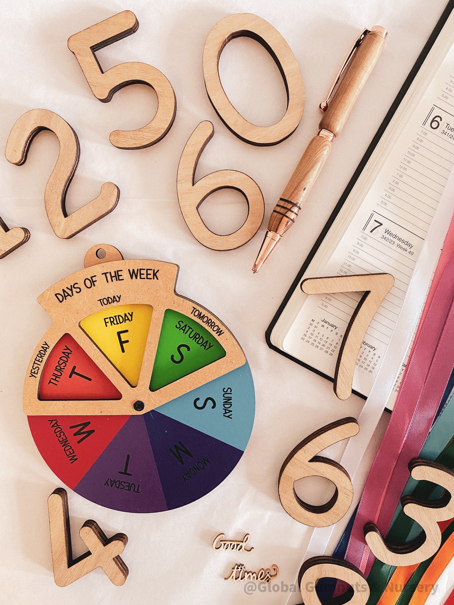 Days of the Week Wheel: Educational MDF round wheel with three-way viewer to display the days of the week; features a spinner for easy use.