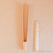 Child-sized wooden long to