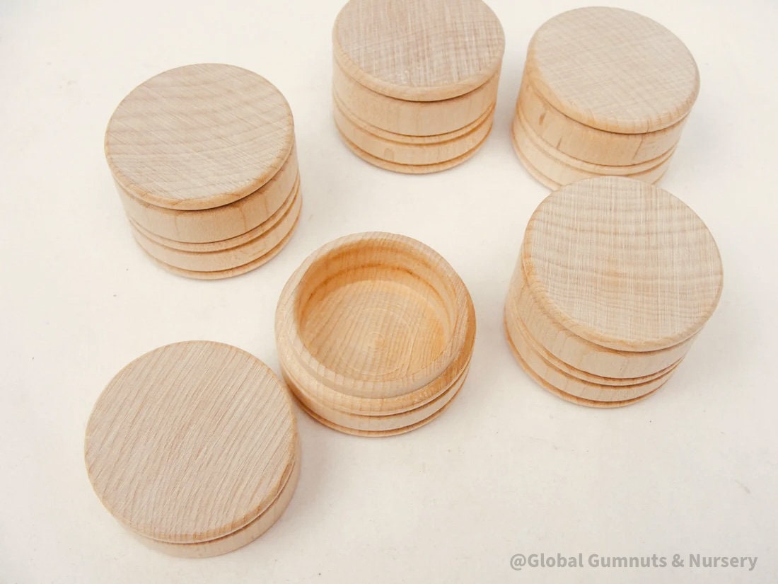 Tooth fairy keepsake jar, a wooden container for storing small treasures like teeth, hair locks, or rings.