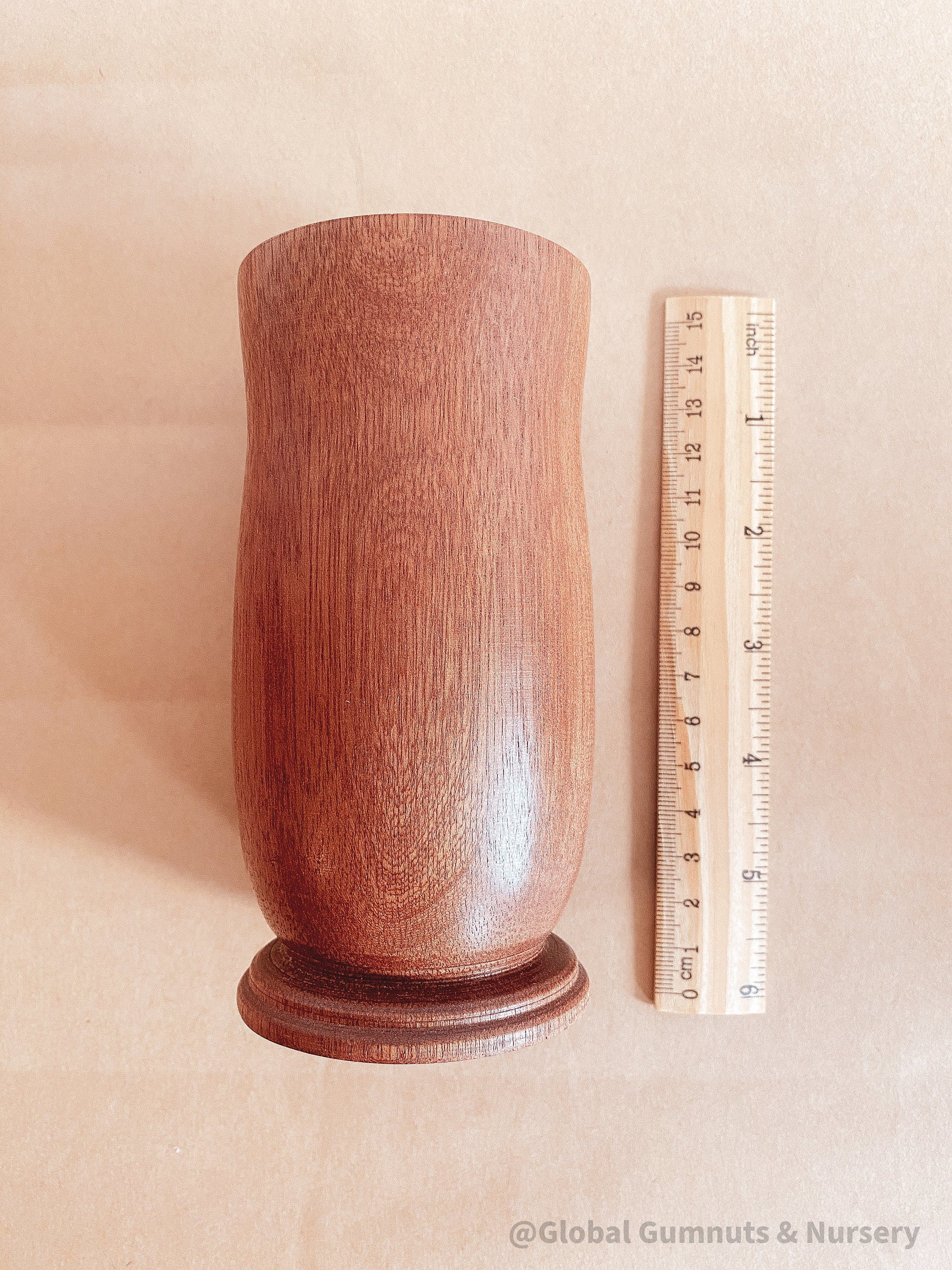 Tall Jarrah vase, a beautiful decor piece for floral arrangements.