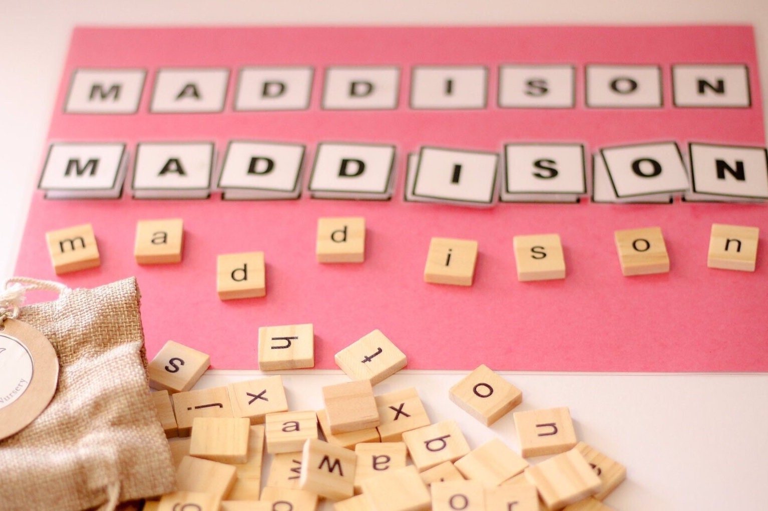 26-piece wooden uppercase letter tiles, ideal for teaching letter recognition, Scrabble, and creative craft projects.