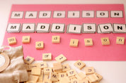 26-piece wooden uppercase letter tiles, ideal for teaching letter recognition, Scrabble, and creative craft projects.