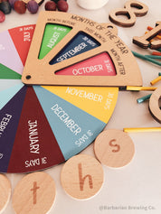 Months of the Year Wheel: Interactive spinner wheel to teach the months.