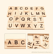 26-piece wooden uppercase letter tiles, ideal for teaching letter recognition, Scrabble, and creative craft projects.