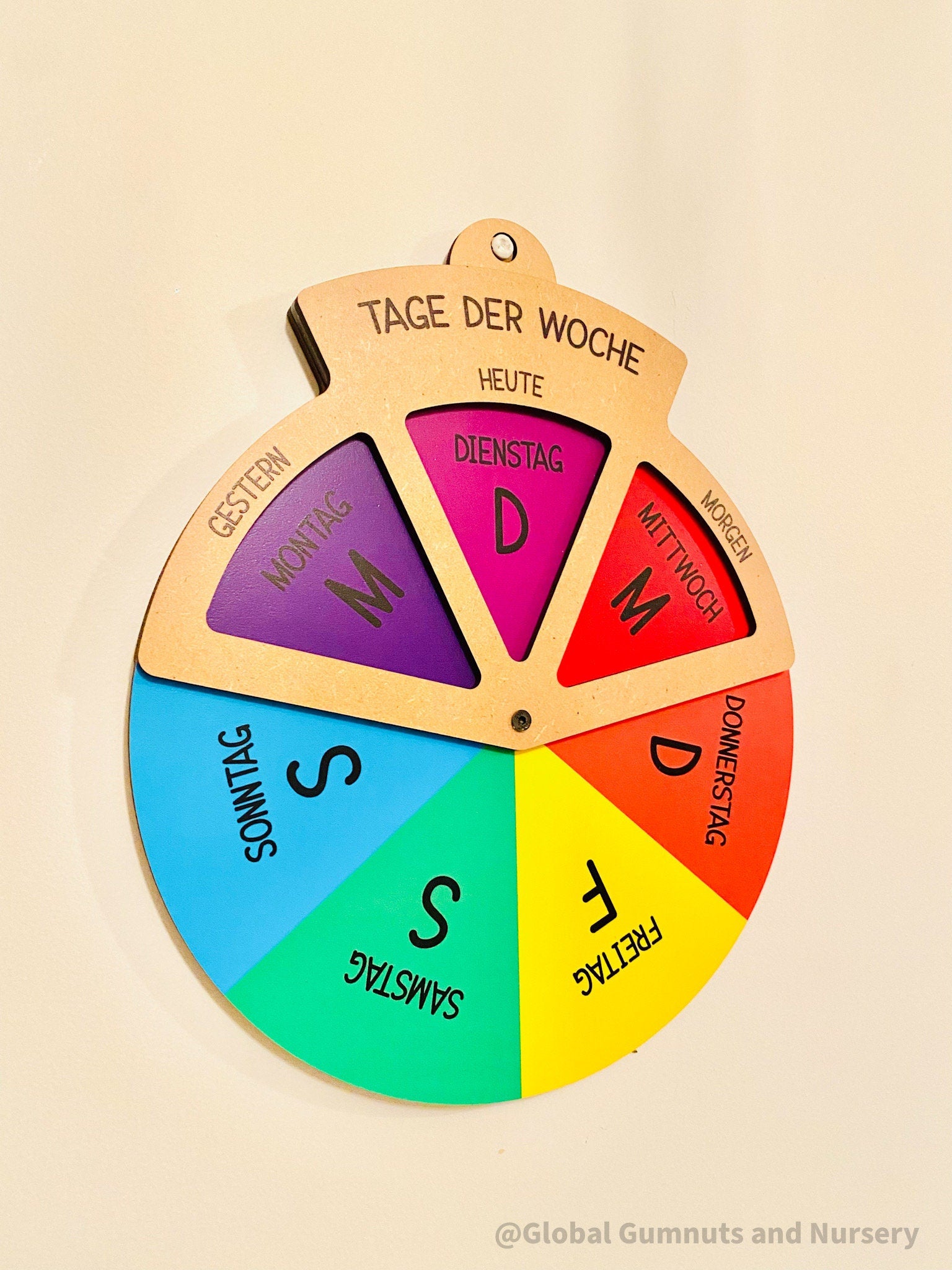 german days of the week wheel: spinner dial displaying days of the week in german.