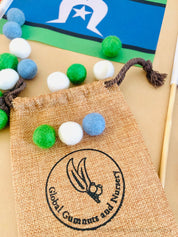Torres Strait Islander Flag Ornament: Wooden flag on a pole for NAIDOC Week displays.