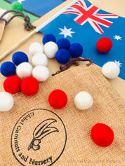 Australian Flag on Wooden Pole: Aboriginal and Australian flag set with optional felt balls.