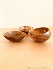 Sensory Coconut Bowl Set – Eco-Friendly Decor: Coconut bowl set with twine handles, ideal for sensory play or rustic home decor.