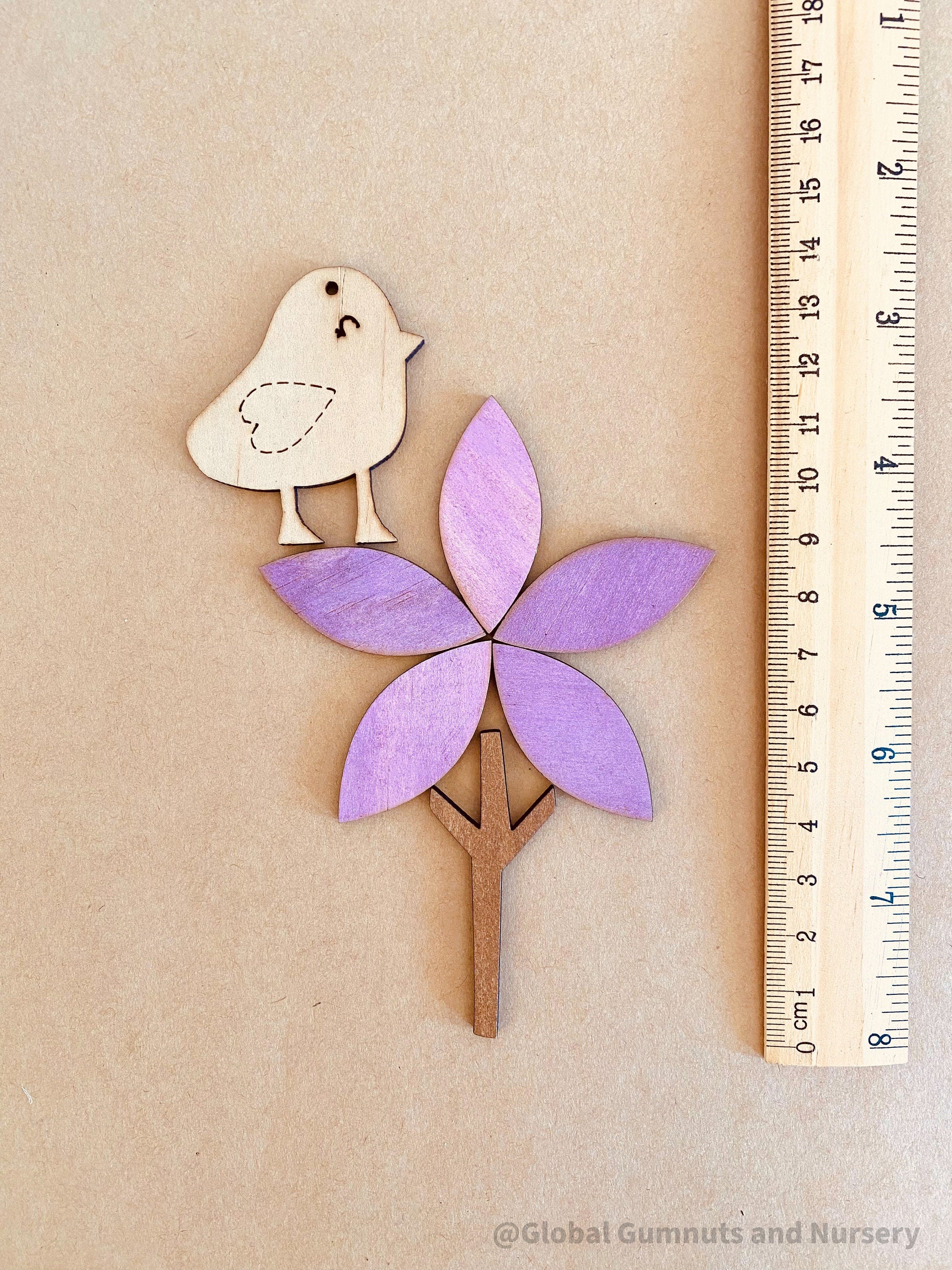 Flower + Bird Wooden Embellishment Set – 7 Pieces: Seven-piece wooden set with bird and floral designs, great for personalized DIY projects.