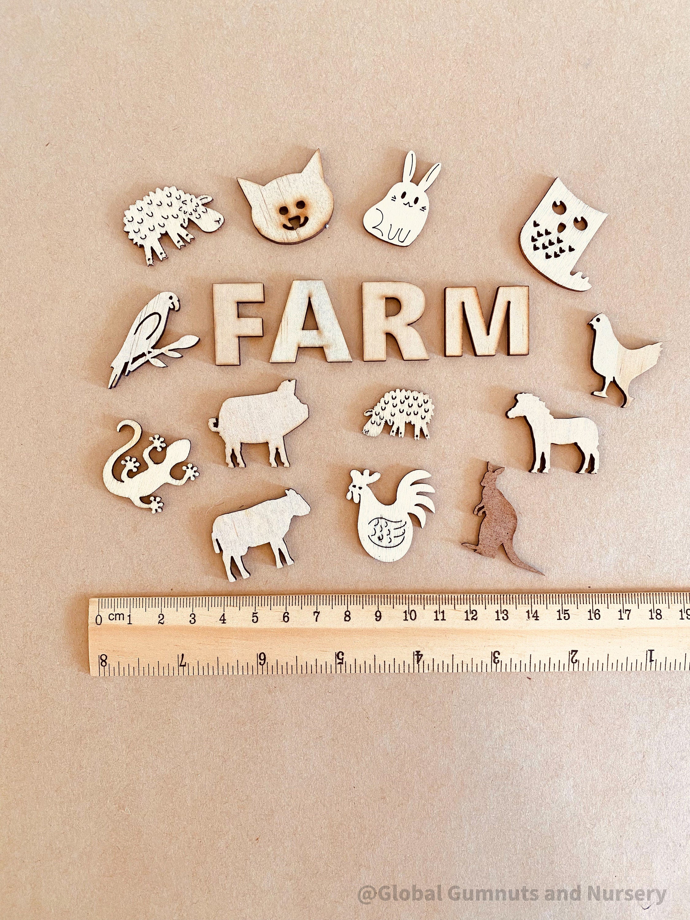 Farm Animal Embellishments Set: 17 rustic animal-themed pieces for crafts and decor.