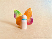 Wool felt butterflies, perfect for play, autumn crafts, or as pocket fairy friends with a wooden body.
