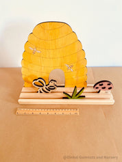 Bee Story Stage: Small world play set with a beehive and bee life cycle.