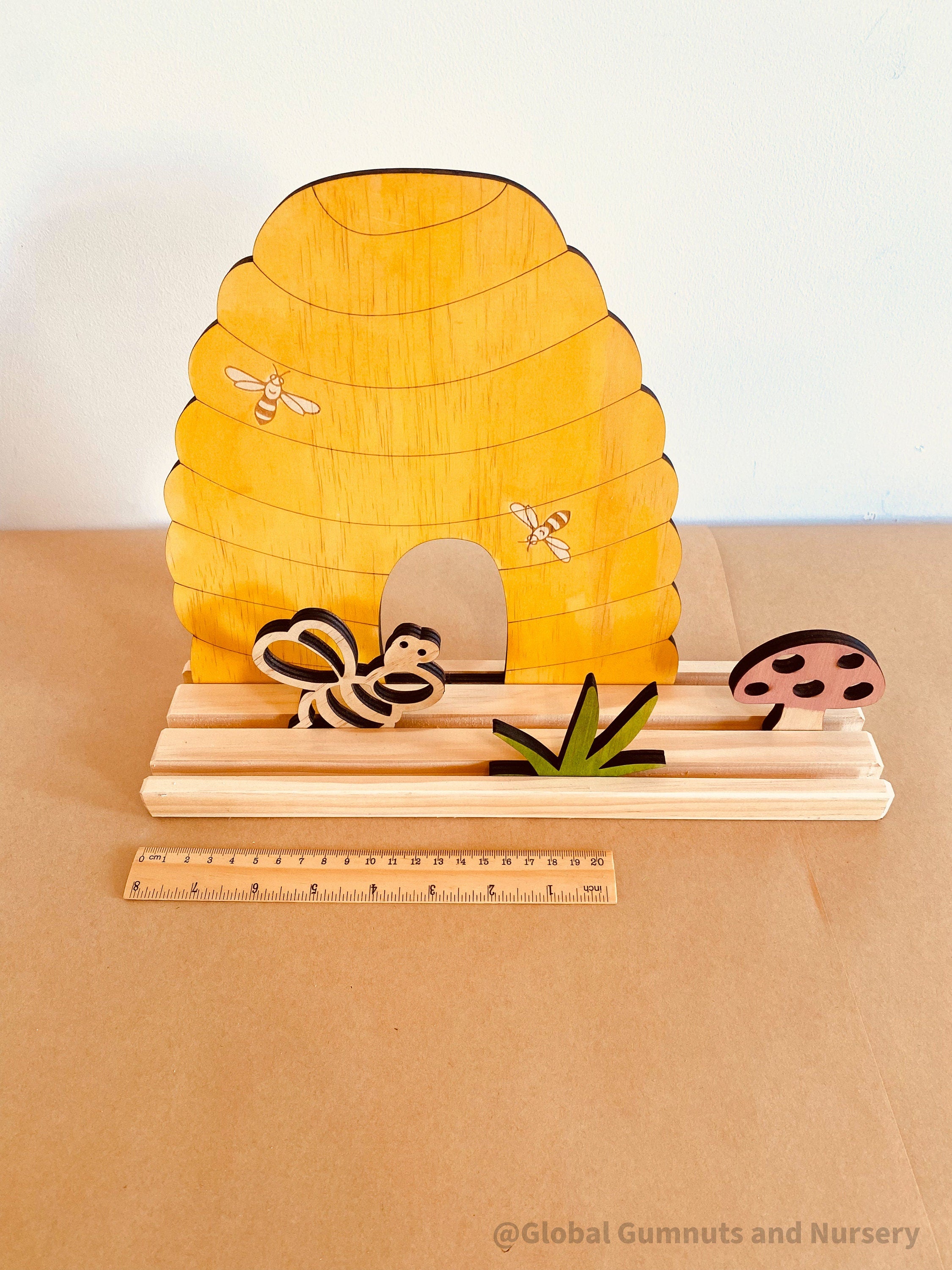 Bee Story Stage: Small world play set with a beehive and bee life cycle.