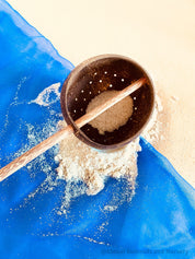 Short handle sand or water scoop, a kid-friendly tool for mud kitchens or play.
