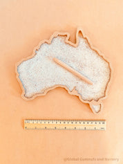Sensory wonderland with the Australia tray, includes drawing pencil and sand.