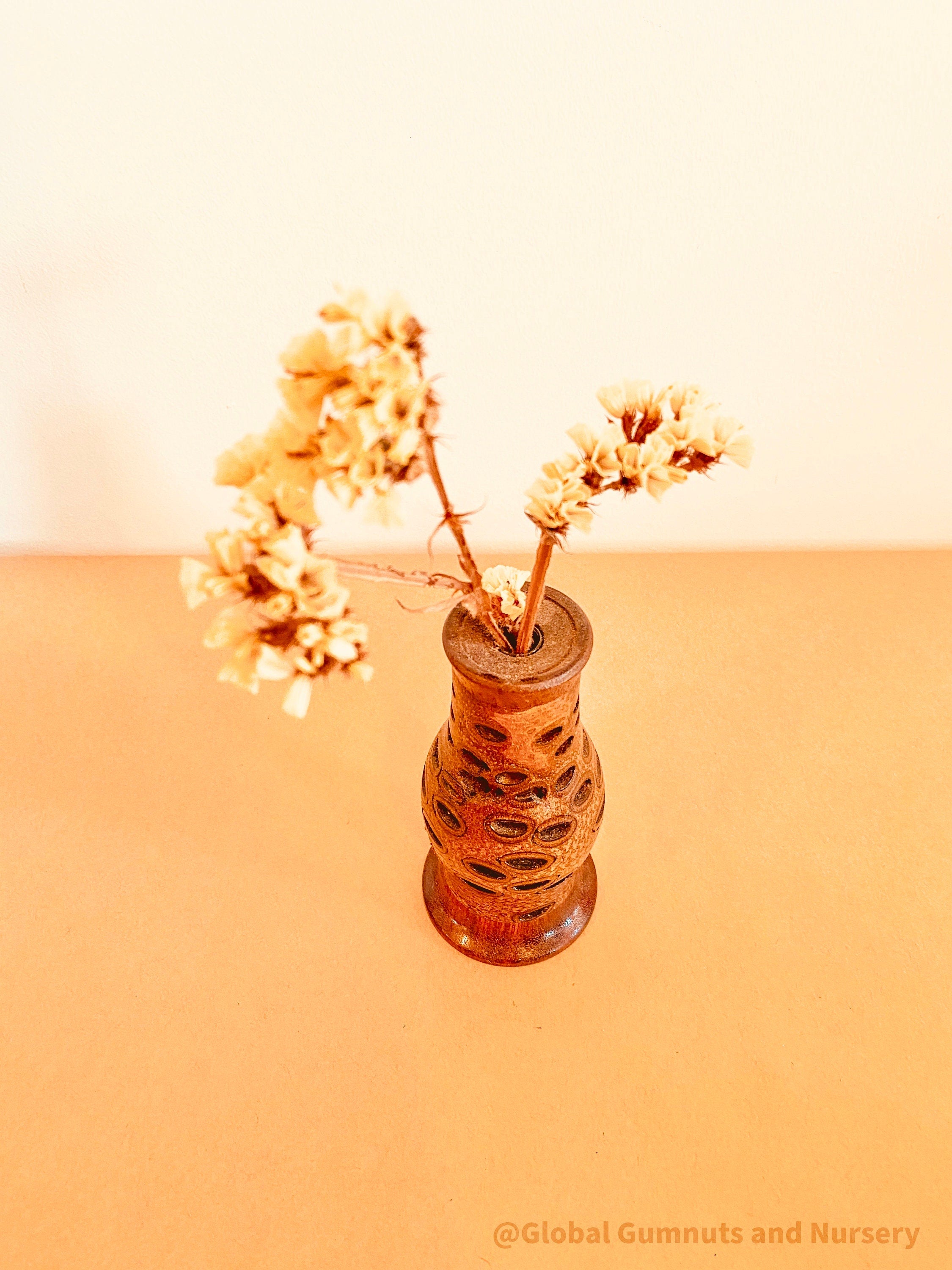 Tall Banksia Vase: Handcrafted banksia vase for home decor.
