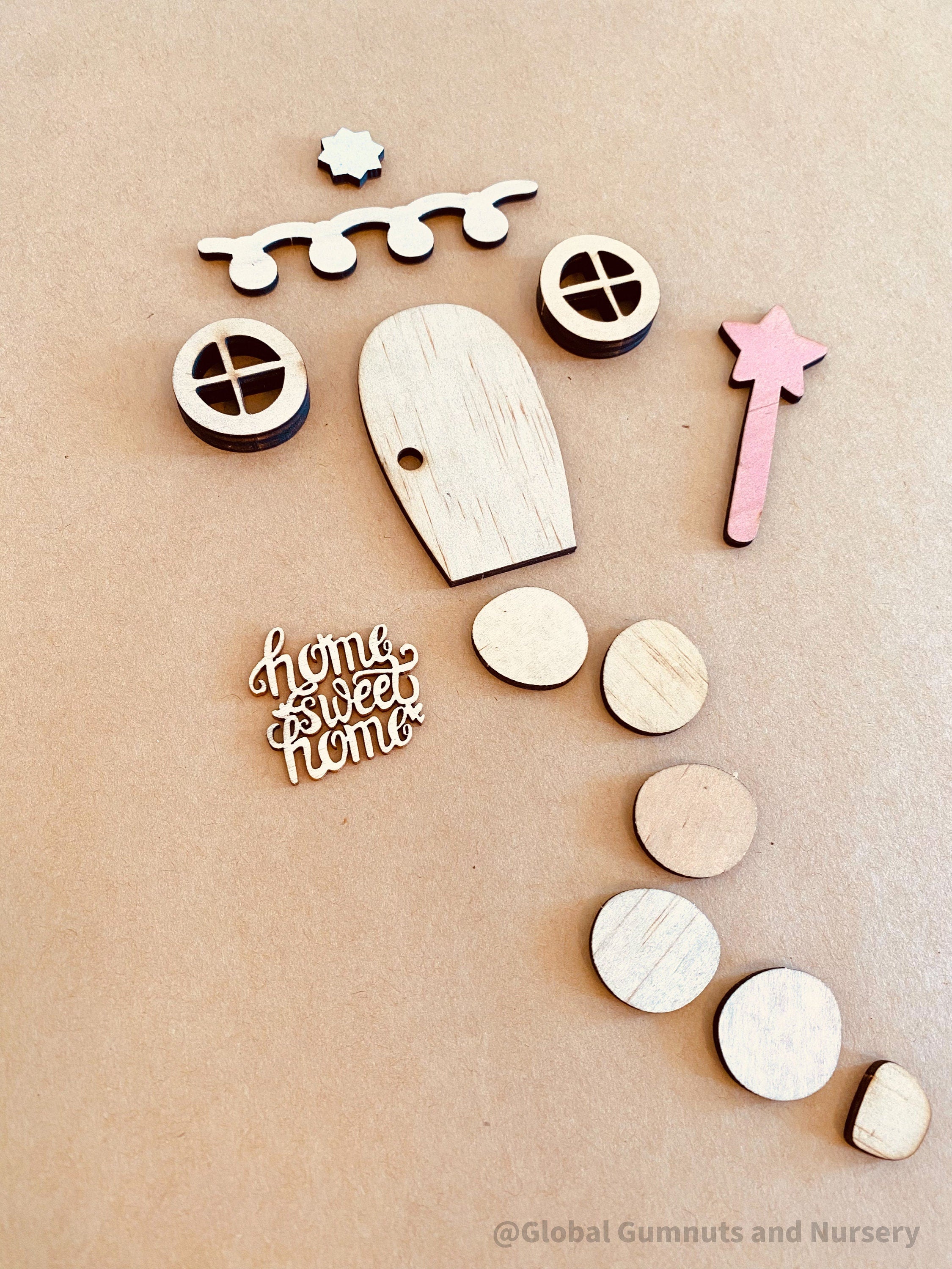 Fairy Garden Wooden Embellishment Set – 11 Pieces: Explore creativity with these 11 wooden embellishment pieces, perfect for decorating and crafting fairy gardens.