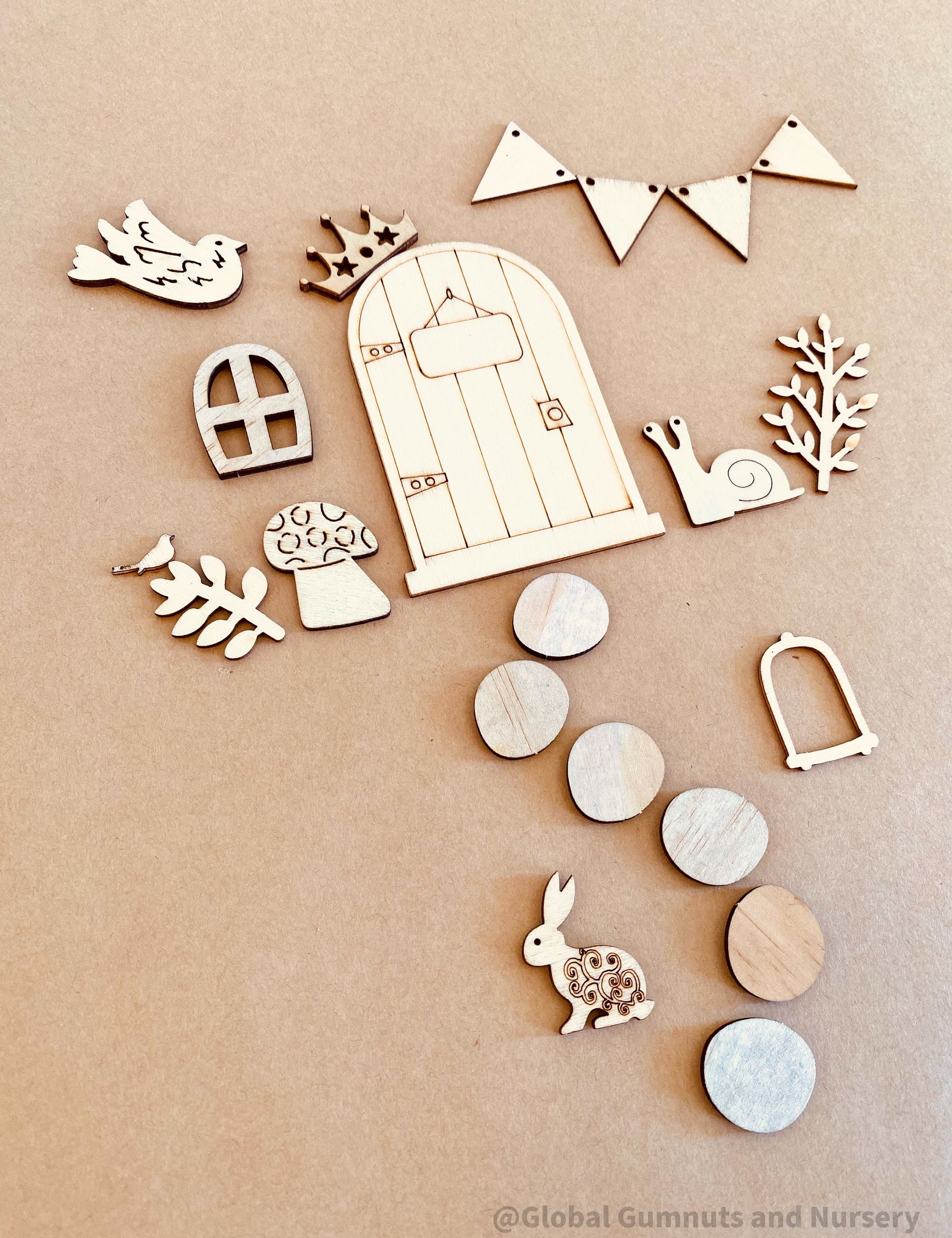 Fairy Garden Wooden Embellishment Set – 19 Pieces: Create magic with this 19-piece raw wooden set, ideal for fairy garden decorations or DIY crafts.