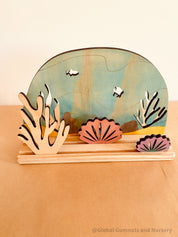Ocean Story Stage: Small world play set with ocean scenes and marine life.