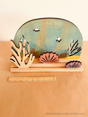 Ocean Story Stage: Small world play set with ocean scenes and marine life.