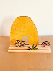 Bee Story Stage: Small world play set with a beehive and bee life cycle.