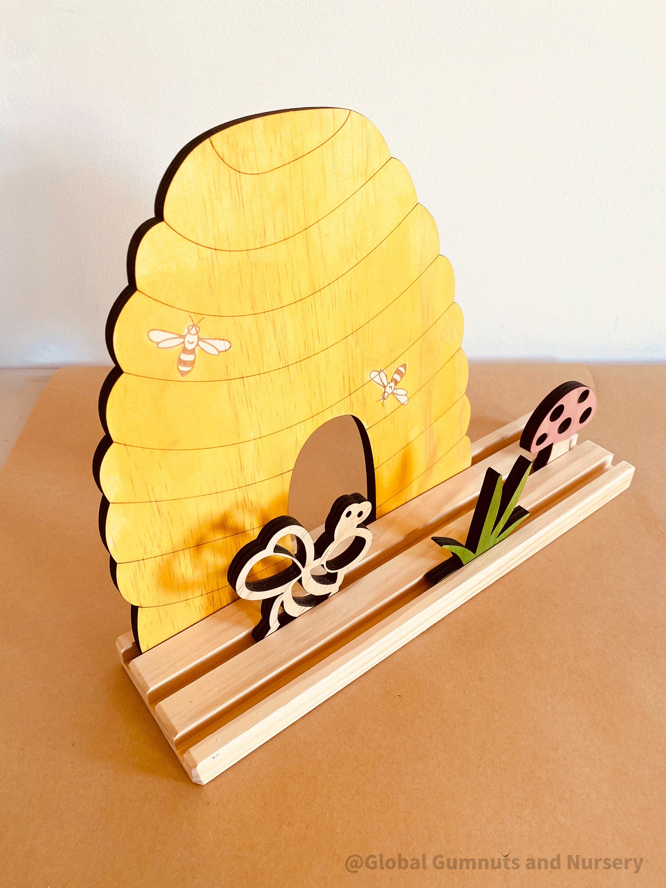 Bee Story Stage: Small world play set with a beehive and bee life cycle.
