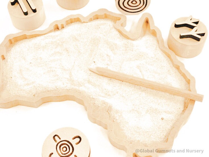 Sensory wonderland with the Australia tray, includes drawing pencil and sand.