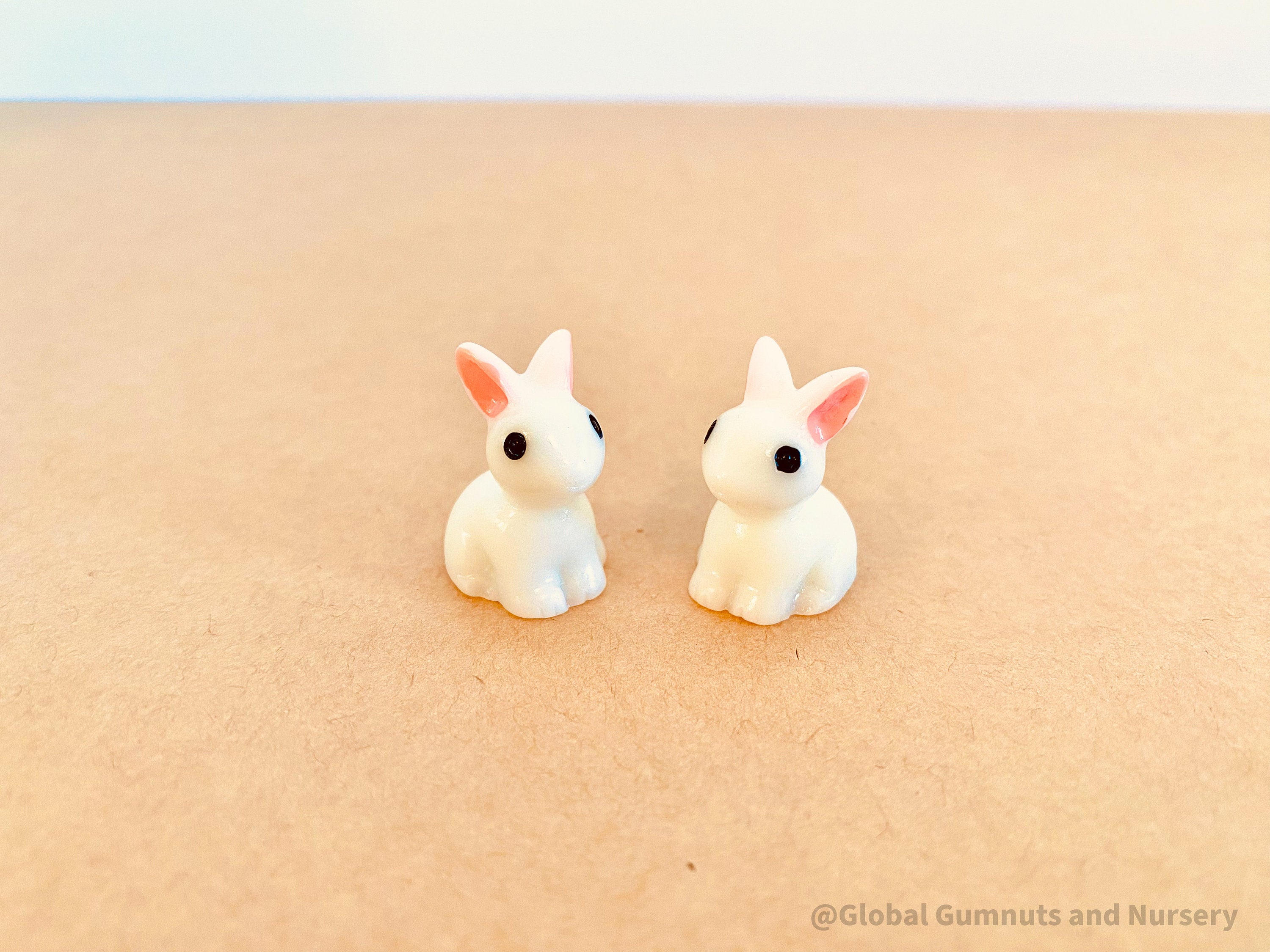 Resin Bunny Figurines: White bunny rabbit figurines for crafts and playful decor.