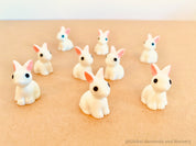 Resin Bunny Figurines: White bunny rabbit figurines for crafts and playful decor.