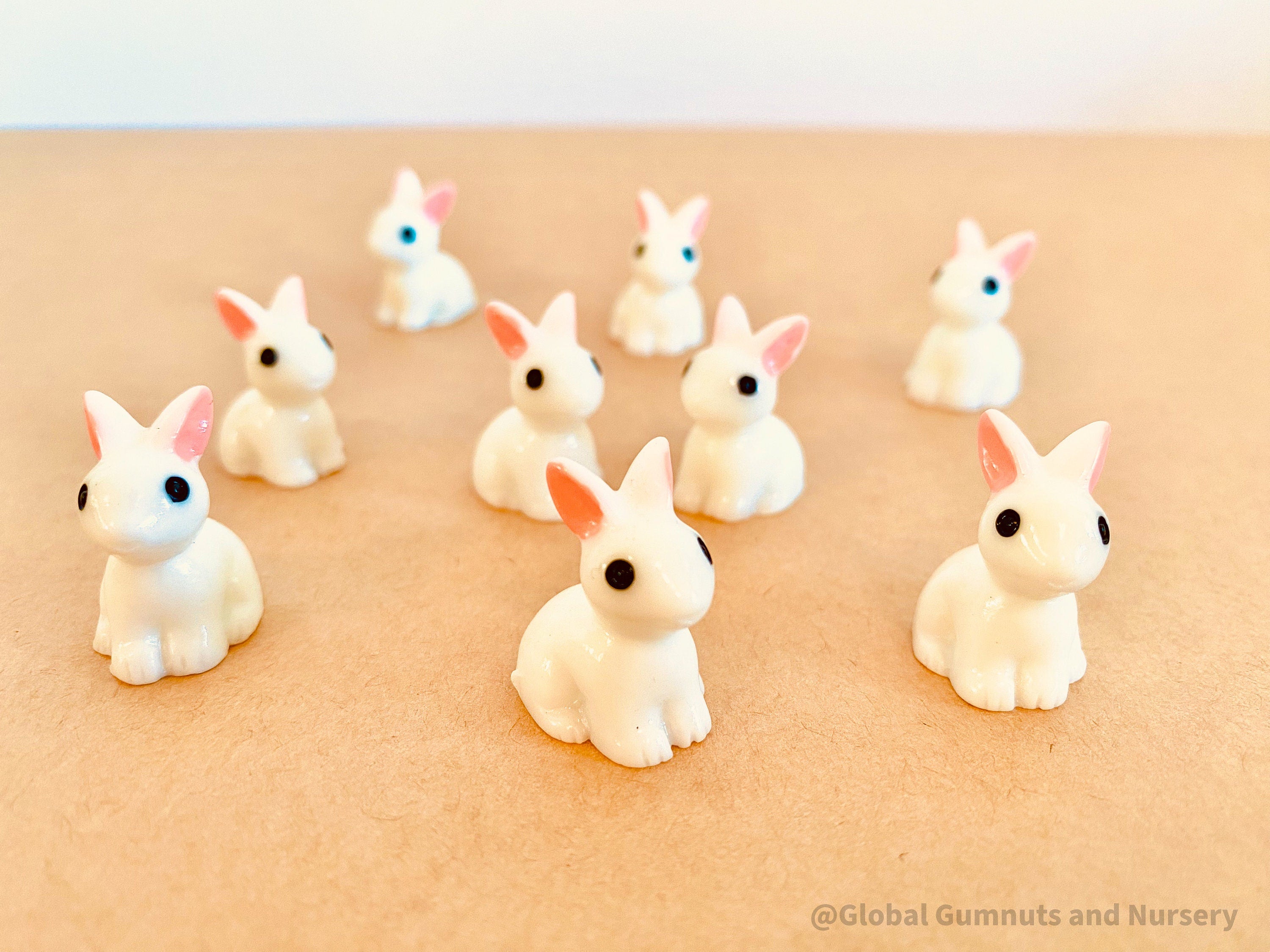 Resin Bunny Figurines: White bunny rabbit figurines for crafts and playful decor.