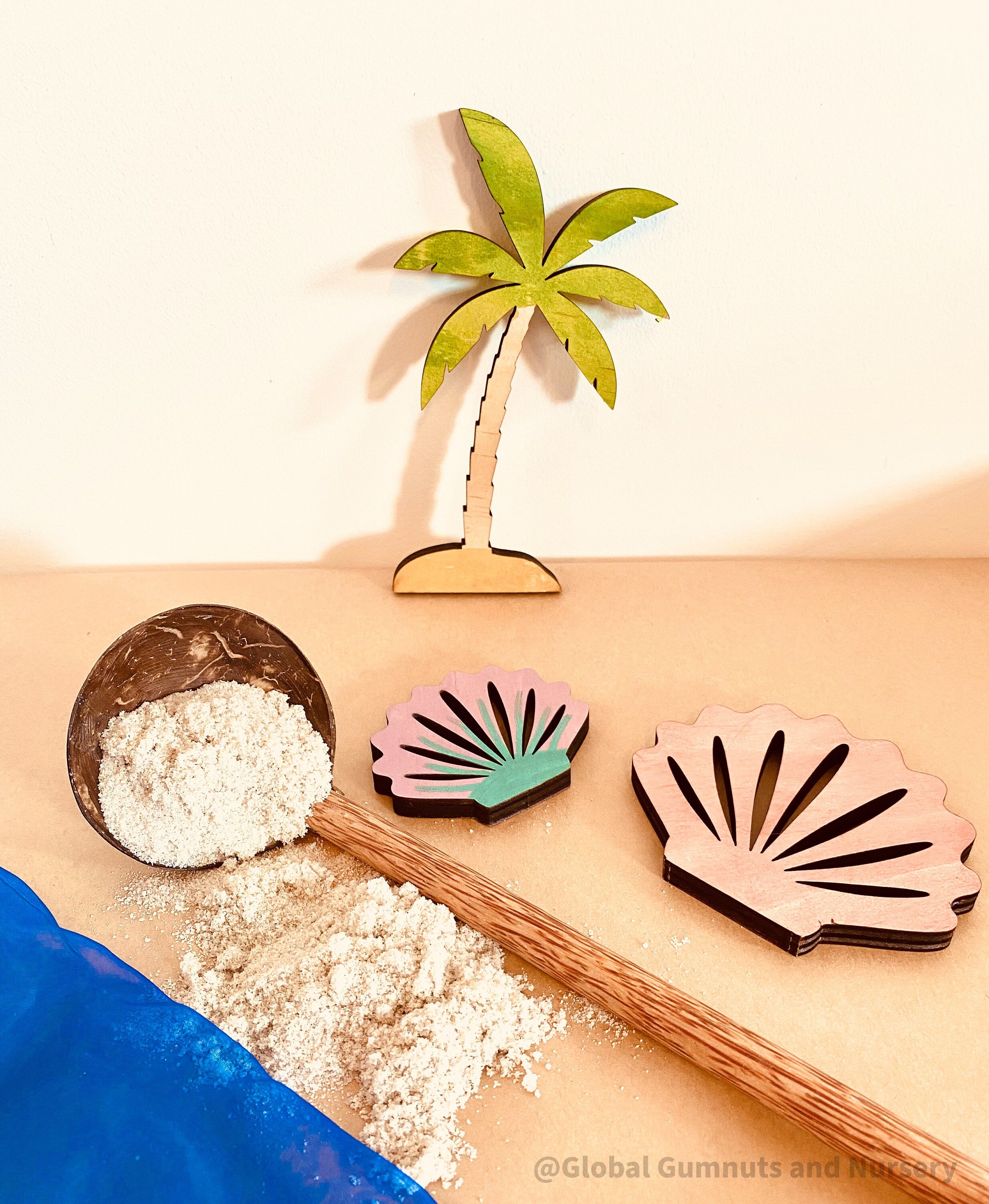Coconut Water Scoop: Handcrafted coconut ladle for water play or serving.