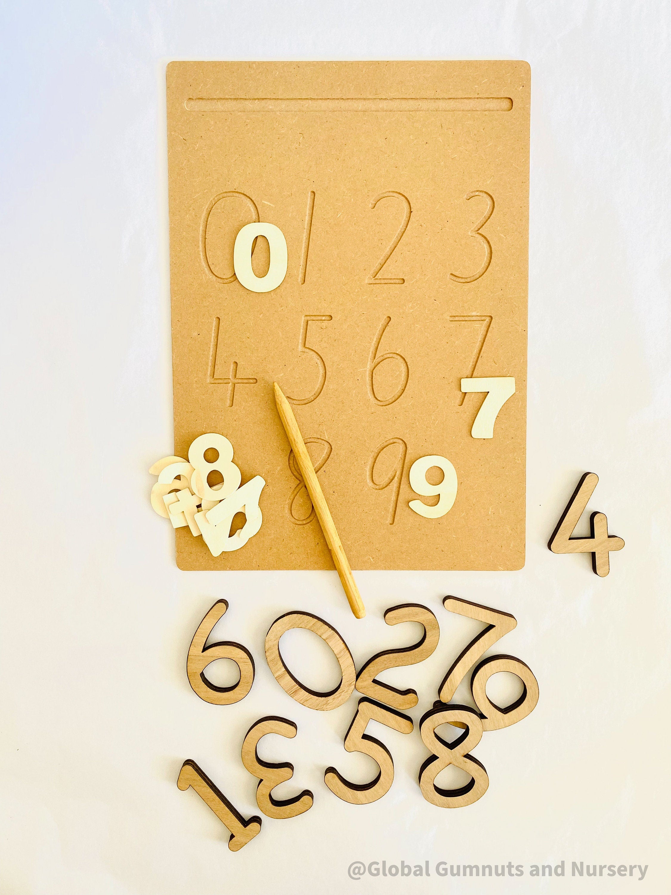 numbers 0-9 tracing board: montessori-style wooden tracing board with a stylus, helping children learn to trace and recognize numbers.
