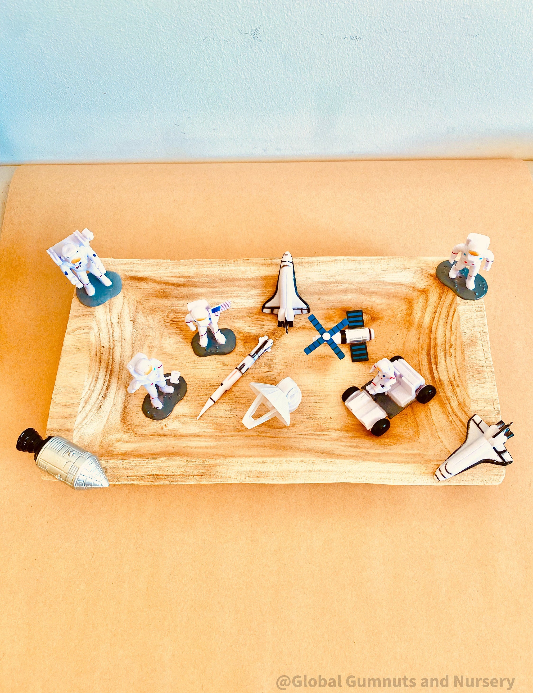 11-piece plastic space explorer figurine set with astronauts, rockets, and space vehicles. Inspires imaginative play and learning about the cosmos!