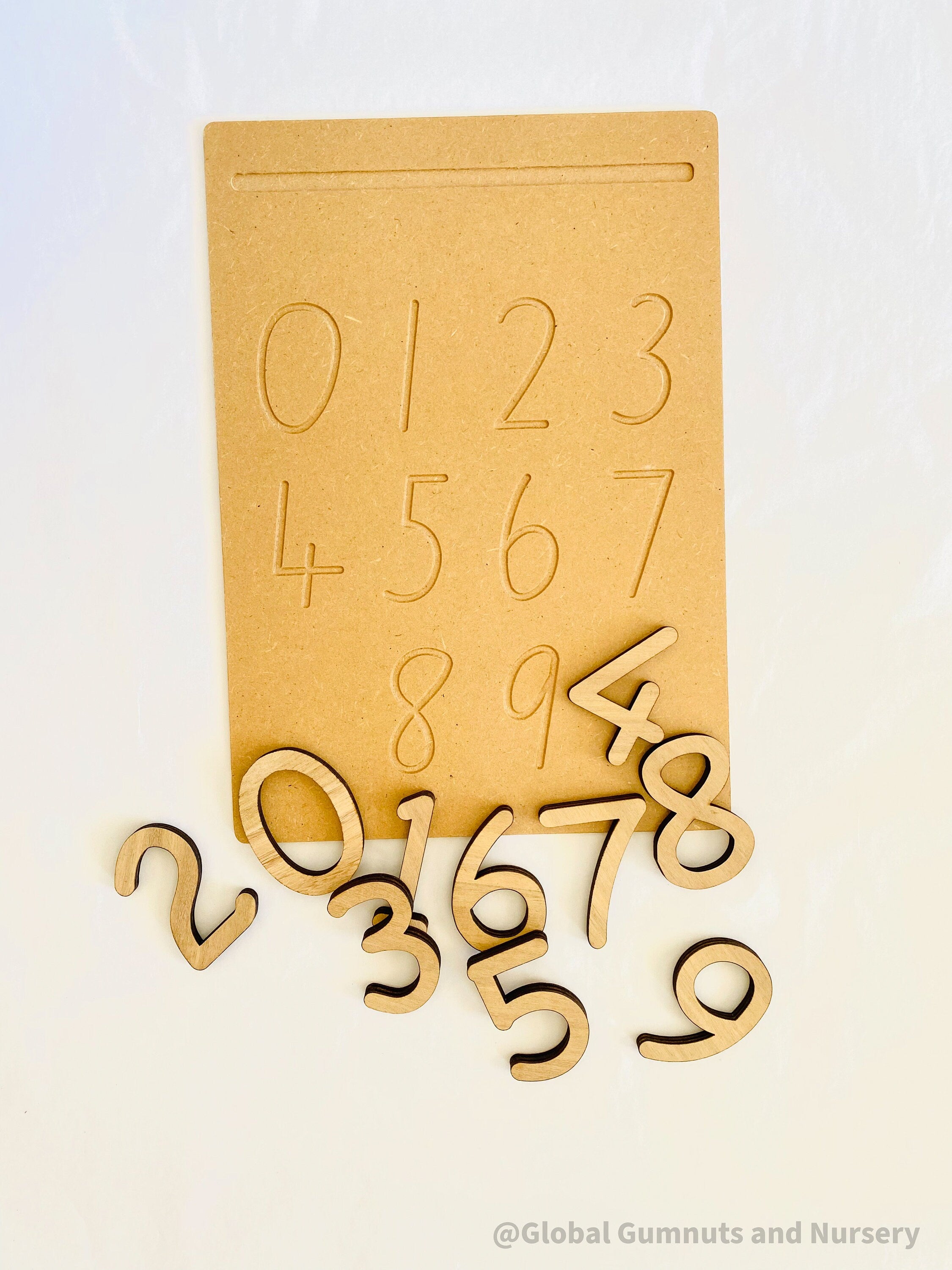 NUMBERS 0-9 Tracing Board: Montessori-style wooden tracing board with a stylus, helping children learn to trace and recognize numbers.