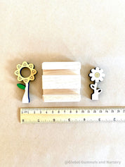 Mini Flower Display with Stand: Floral decor with a stand for small-world scenes and displays.
