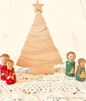 Peg people and tree set, hand-painted and crafted by a local wood turner.
